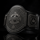 Black championship belt with 'World Champion Wrestling' text on a black background