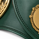 Green leather product with gold decorative elements on a white background