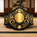 Black and gold martial arts championship belt on a tatami mat