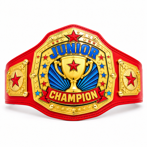 A red and gold championship belt with a central gold trophy emblem, blue 'JUNIOR' lettering, and a red banner reading 'CHAMPION' on a white background.