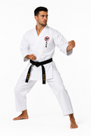 Man in a white martial arts uniform with a black belt on a white background